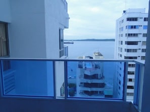 A high-rise building with a view of a body of water and another building across the water. - Studio 1309—perfect for 2 or 4 people (Cartagena de Indias)