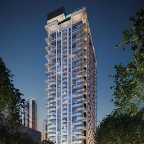 A high-rise building with multiple balconies, likely a hotel or residential complex. - The Crosby Miami Studio by Palermo Home (Miami)