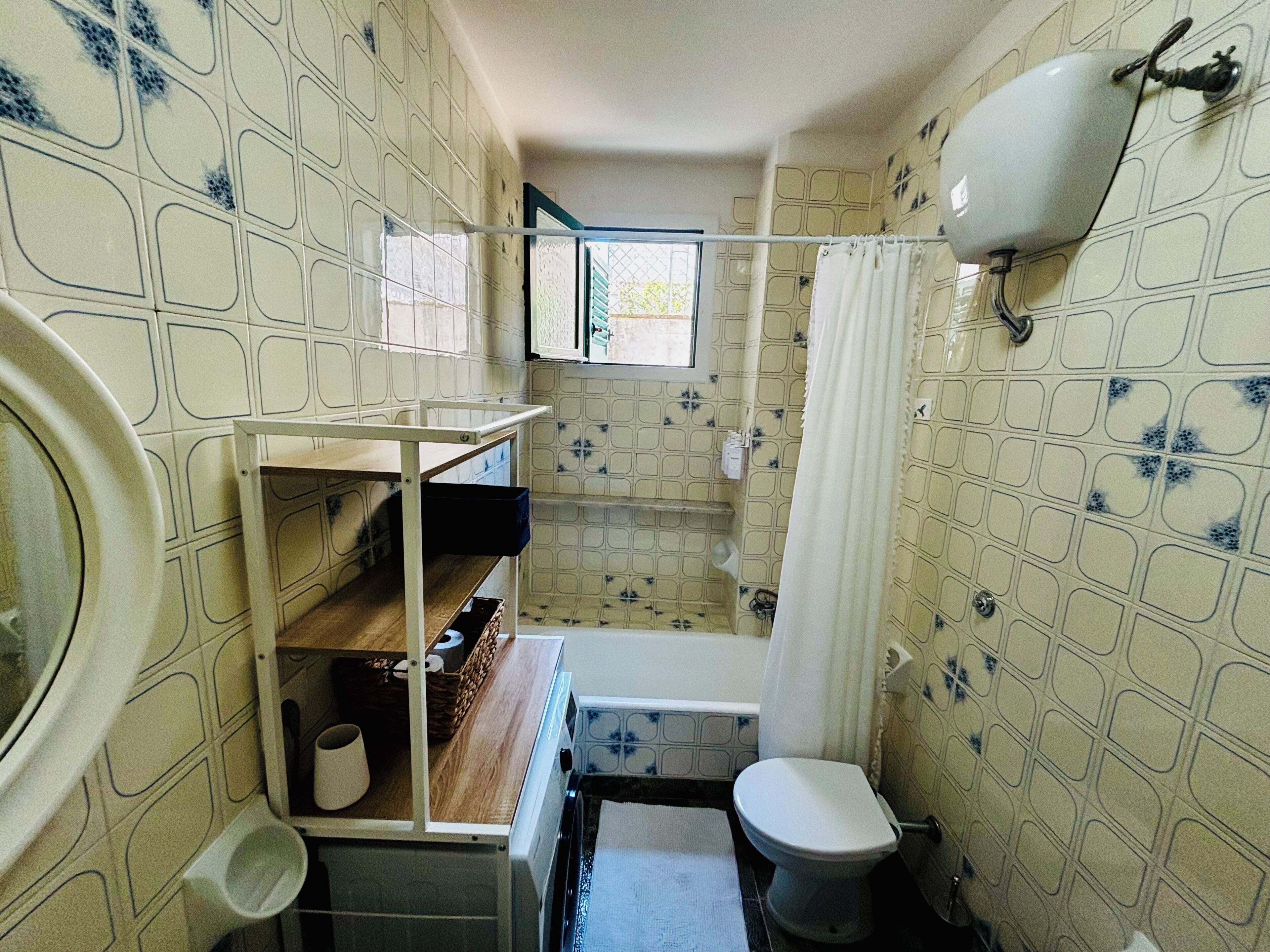Hair dryer, bidet, towels, soap