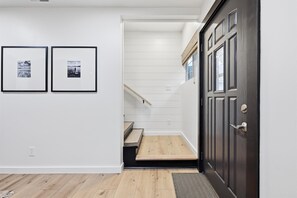Entry way welcomes you to the Crossing.  Do note lots of stairs are required to reach the game room  - Lakefront, Hot Tub, Game Room, Sleeps 12 (Council Bluffs)