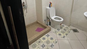 A bathroom with a toilet, shower, and sink. - Perfect chalet for rent North coast porto golf marina (Marsa Matrouh Governorate)