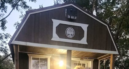 The Dasher Den is a Cozy Tiny Cabin located right off of Highway 41