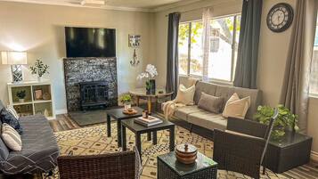 TV, fireplace, books, offices
