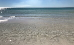 A beach with clear water and a sandy shore. - Yellow House, Gulf Front, Private Steps to Beach (Seagrove Beach)