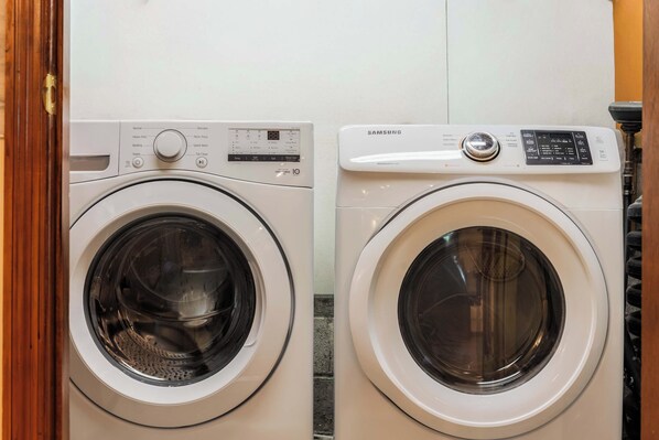 Two front-loading washing machines side by side.