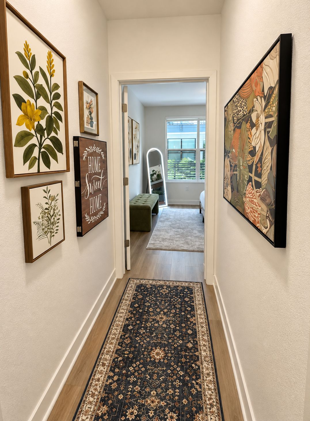 A hallway with framed botanical prints, a rug, and a bench.