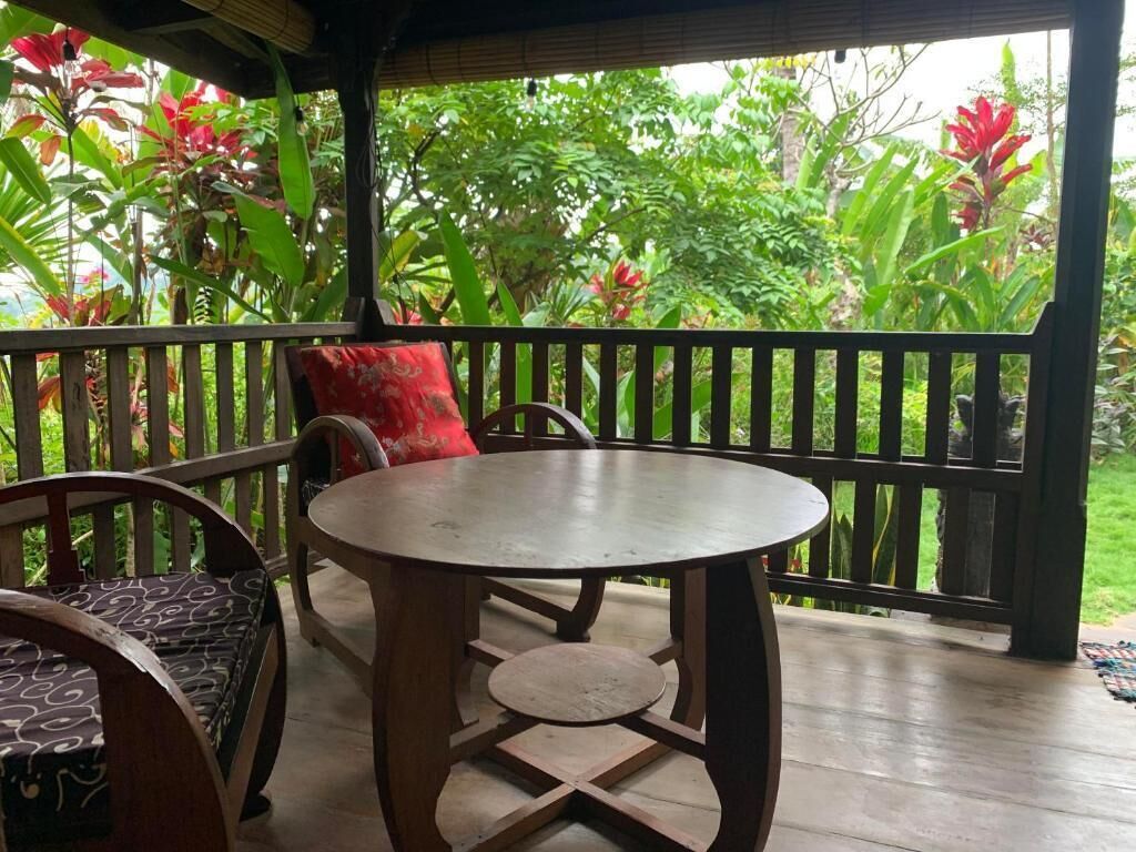 Habitación estándar, balcón, vista al jardín | Restaurante al aire libre