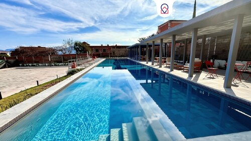 Oasis in El Chante Pool Near the Malecón