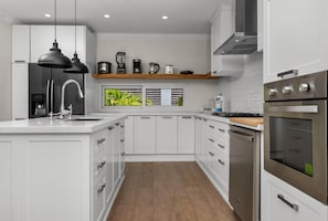Fully equipped modern kitchen! From morning coffee to gourmet dinners, everything you need is ready to go.
