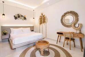 A modern bedroom with a bed, bedside table, and a desk with a chair. - Lena Villa by Tasvan (Badung)