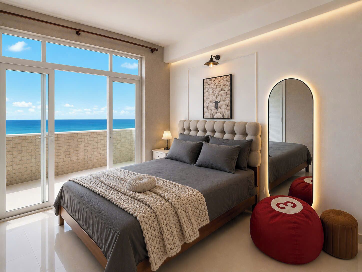 A bedroom with a large window, a bed, a bedside table, a lamp, a mirror, and a wall art piece.