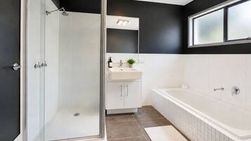 Shower, hair dryer, towels, soap