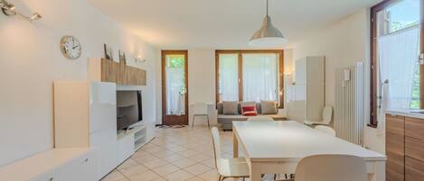 Furniture, Interior Design, Flooring, Floor, Wood, Ceiling, Room, Table, Chair, Lighting
