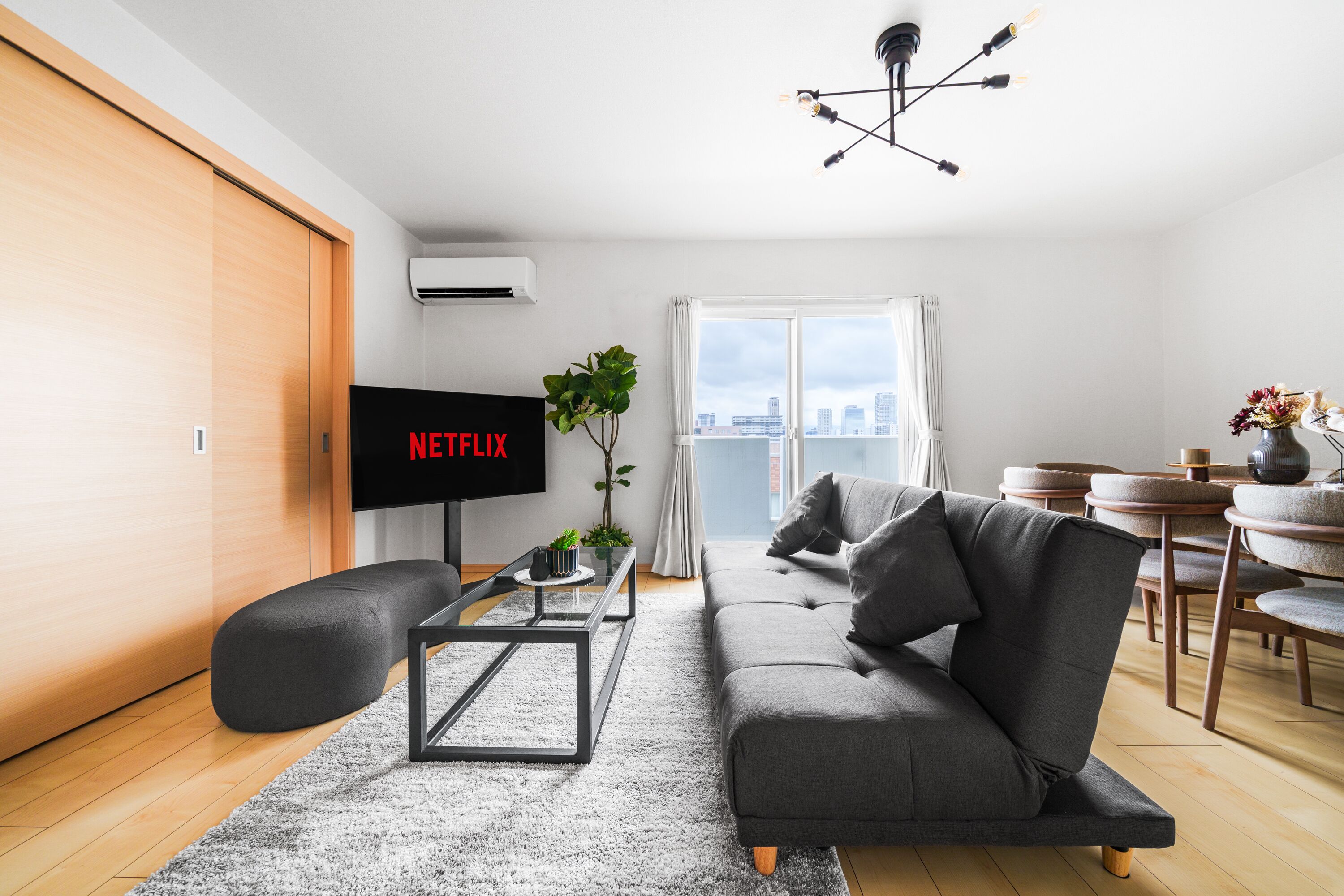 Apartment | Living area | 50-inch flat-screen TV with digital channels