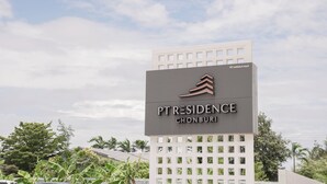 A sign for PT Residence Chonburi with a modern design and a logo. - PT Residence Chonburi (Mueang Chon Buri)