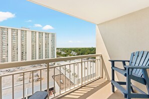 A balcony with a view of a high-rise building and a residential area. - S Hampton 1206 3 Br Oceanview in Kingston, Pool (Myrtle Beach)