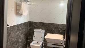 Economy Room, Balcony, City View | Bathroom - Charles Stainless Hotels (Abakaliki)