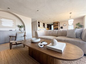 A modern living room with a wooden coffee table, a beige sofa, and a chair. - lEPl Big & Elegant 3 Bd Apt W/Ac Near provenza (Medellín)