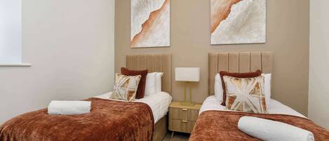 Iron/ironing board, travel crib, WiFi, bed sheets