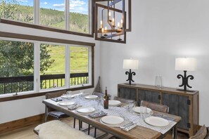 Dining room: Dining table with seating for 8 guests and adjacent breakfast bar with 4 barstools
 - Mountain Village Chalet | Ski-In/Out+ Hot Tub (Mountain Village)