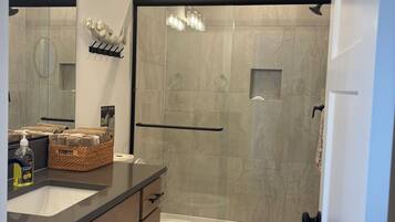 Shower, hair dryer, towels, soap