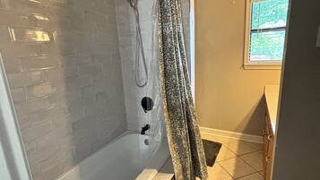 Hair dryer, towels, soap, shampoo