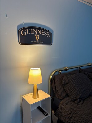 A hotel sign with the name 'GUINNESS' and location 'ST. JAMES'S GATE, DUBLIN, IRELAND'.