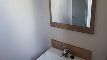 Shower, towels, toilet paper