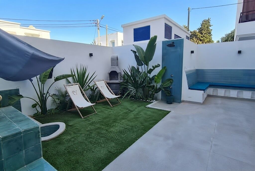 Ático Deluxe, vistas a la playa | Jardines del alojamiento