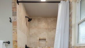A shower area with a tiled floor, a white shower curtain, and a window on the right. - Relax In Sedona/Thunder Mountain View-FLAT (Sedona)