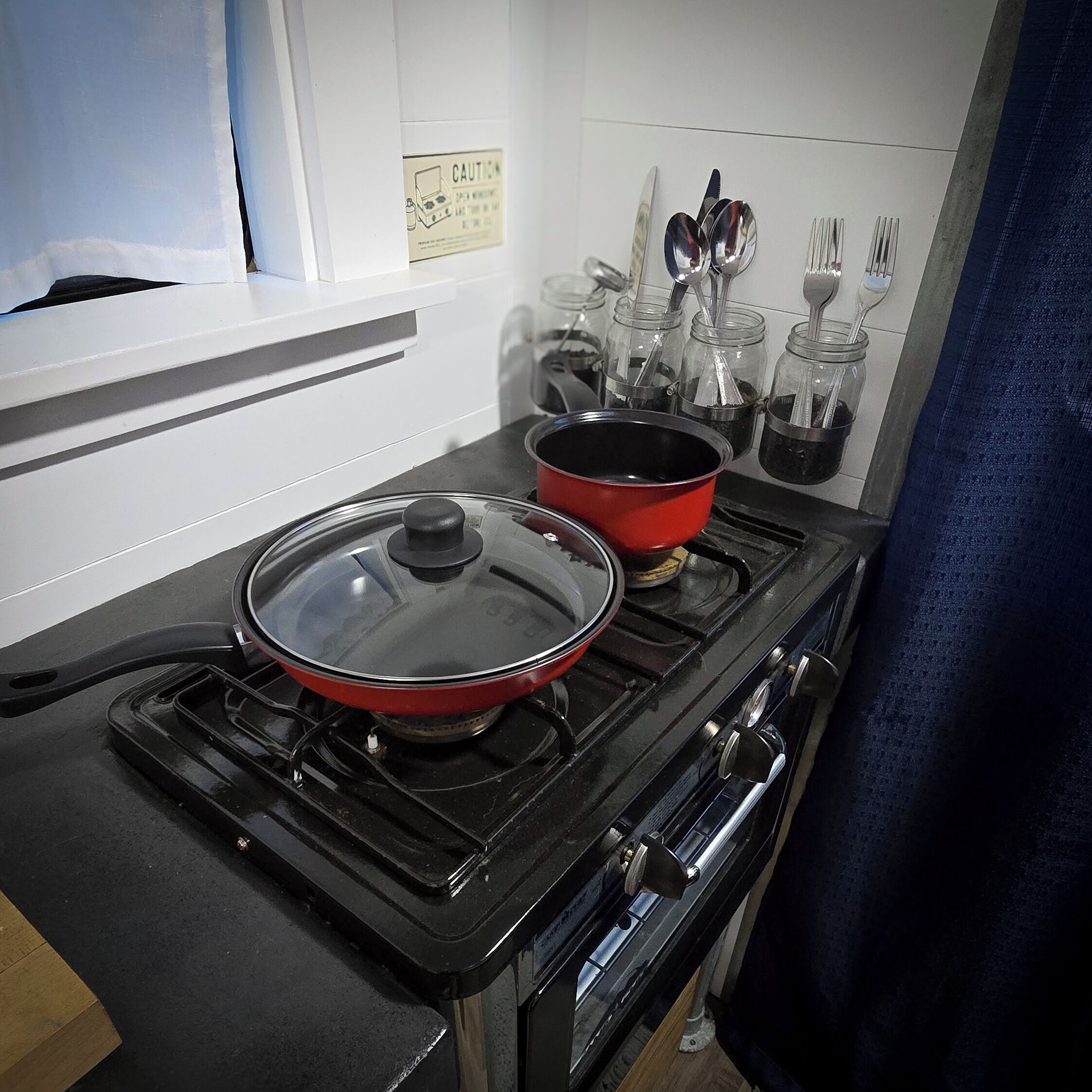 Fridge, electric kettle, cookware/dishes/utensils