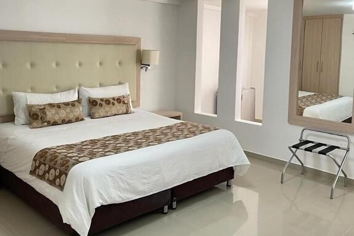 Junior Suite, River View | In-room safe, desk, laptop workspace, WiFi