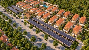 A residential area with multiple houses, a swimming pool, and solar panels. - Ramada Resort By Wyndham Datca (Datca)