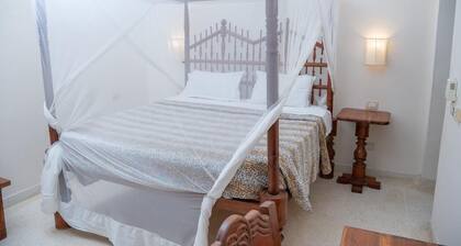 Tropical 2BR Malindi Condo | Pool & Balcony Views ❤️