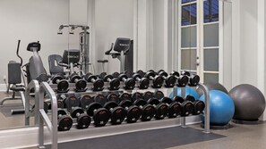 A gym with a rack of dumbbells, exercise balls, and weight machines. - Union Square San Francisco 1BR Deluxe Suite – Club Wyndham Canterbury (San Francisco)