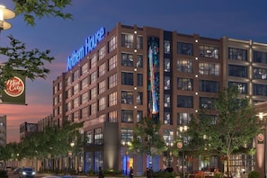 A hotel with a prominent 'Anthem House' sign, multiple floors, and a large vertical display on the facade. - Modern Huntsville Stay | 1 Unit | Near Mid City Drive (Huntsville)