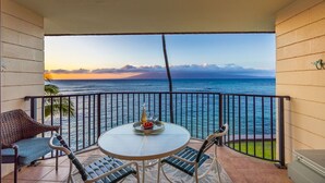 Outdoor dining - Modern and Bright Kahana Retreat, a Cozy Coastal 1BR with Pool & AC, Ocean-View (Lahaina)