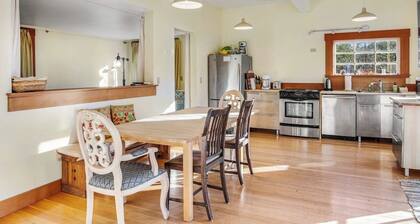 Classic farmhouse-style home with front porch & amazing sunset views - walk to town