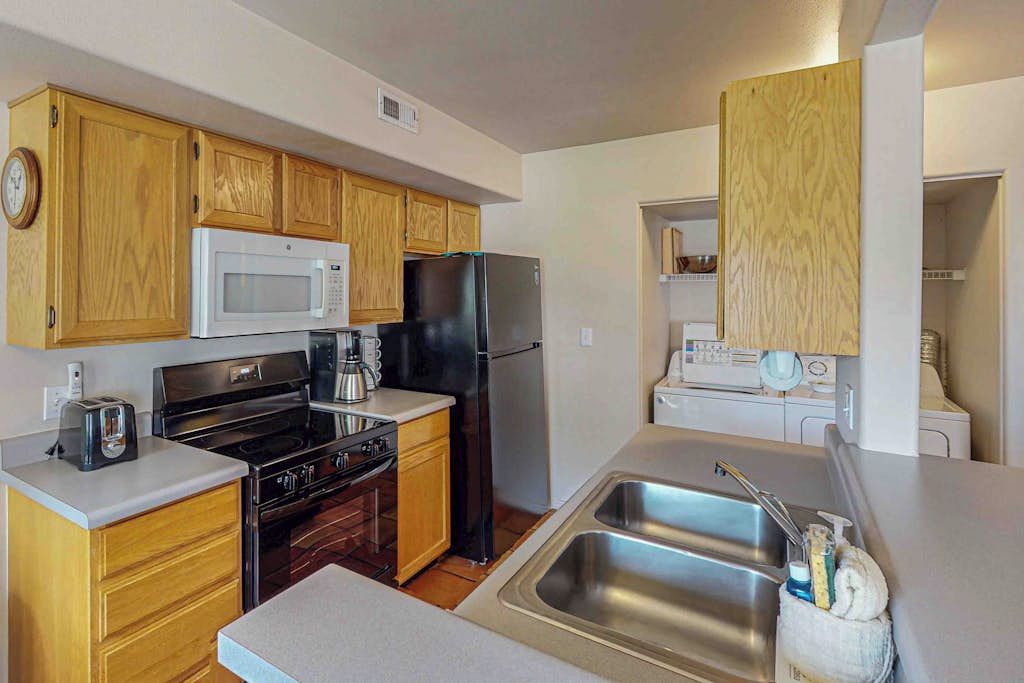 Coffee/tea maker, fridge, microwave, oven