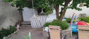Holiday Home 'Lilly Of Lemnos' with Shared Terrace, Private Garden and Air Conditioning