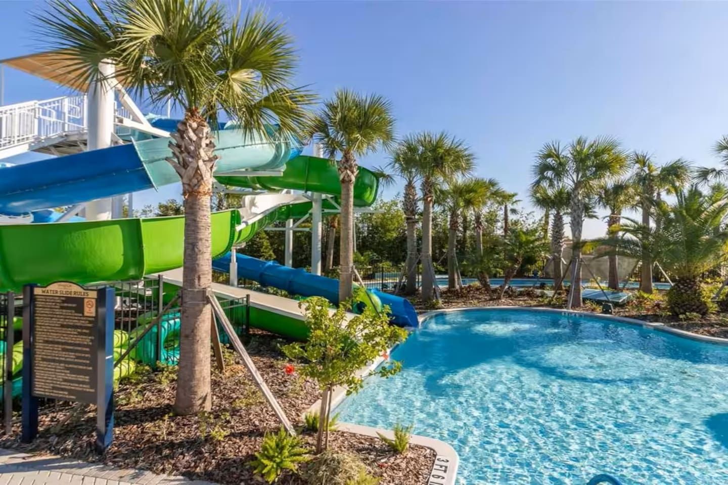A water park with slides and a pool.