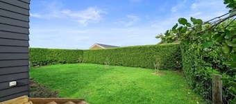 Wine, dine, swim, work or relax here in this sunny Martinborough holiday home.