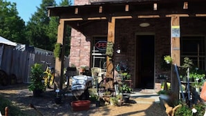A brick building with a sign reading 'Moon Lake Trading Company.'