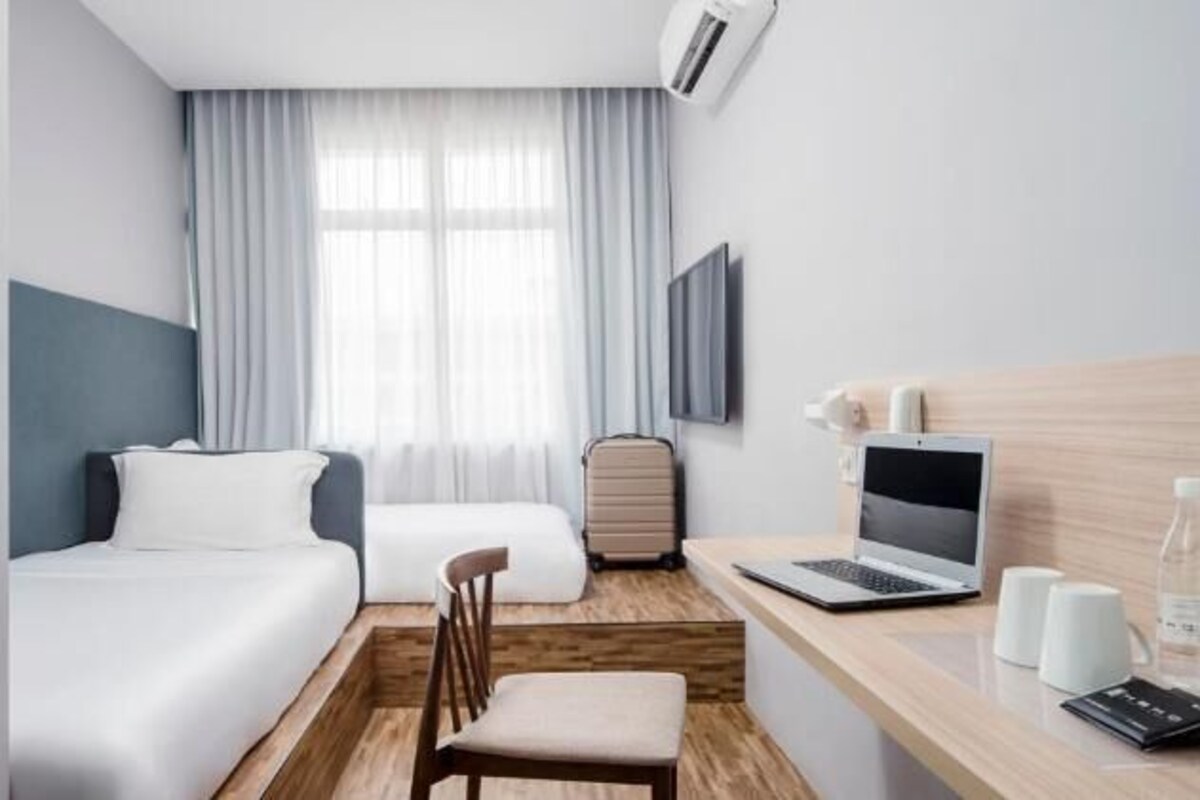 Kamar Twin Deluks, pemandangan kota | Meja kerja, ruang kerja ramah laptop, dan Wi-Fi gratis