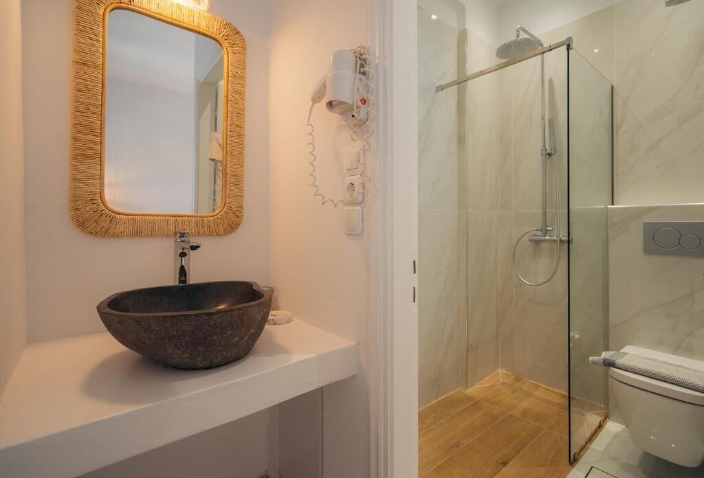 Double or Twin Room, Garden View | Bathroom | Shower, hair dryer, towels, soap