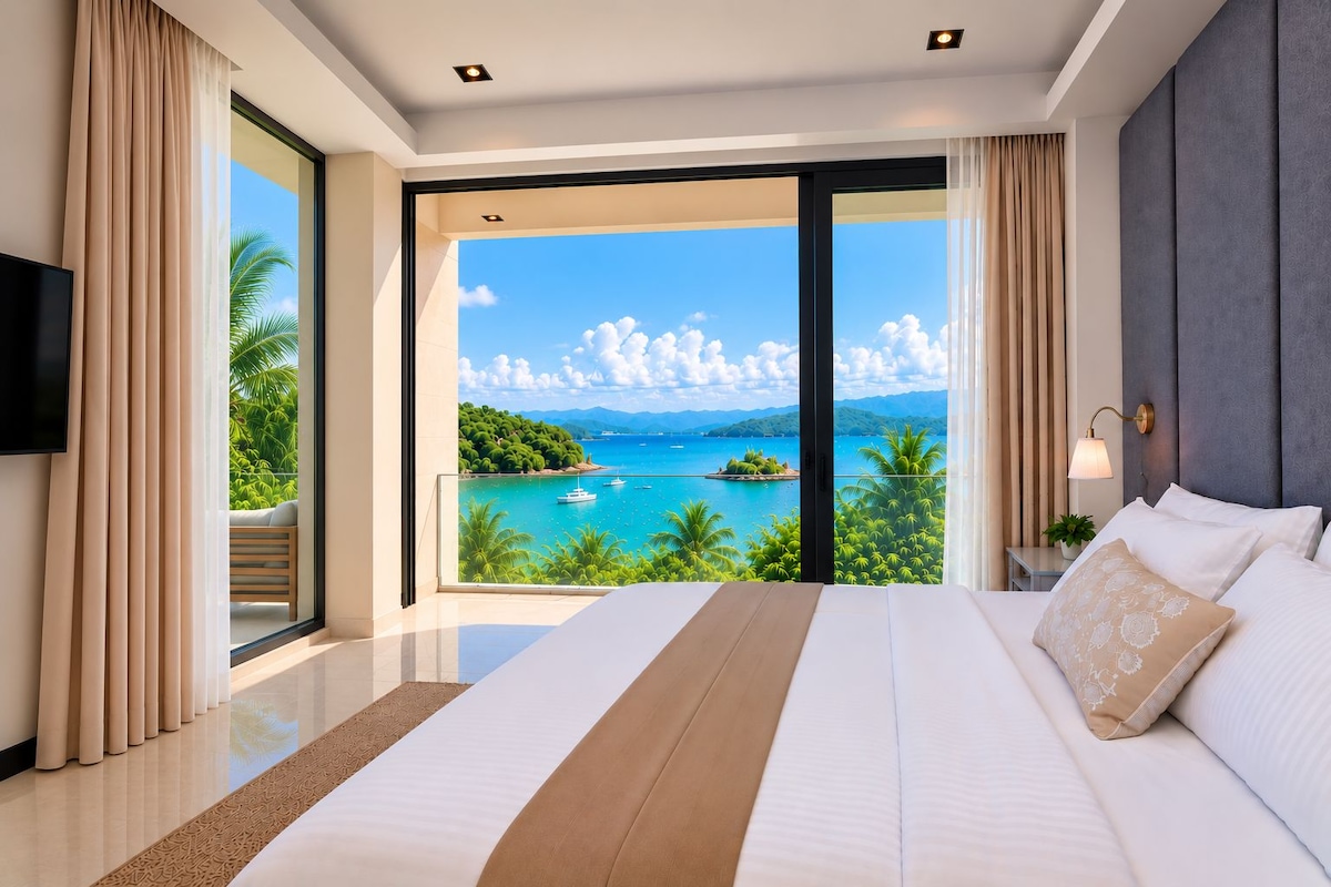 A modern bedroom with a large bed, a TV, and a view of a tropical landscape.