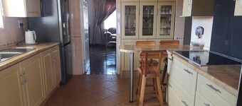 Location d'une maison sereine de 3 chambres près du Sun City Resort
