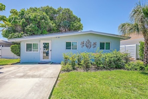 A single-story house with a front door, two windows, and a small porch. - 1 Mi to Vanderbilt Beach! Group-Friendly Getaway (Naples)