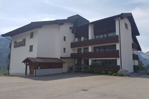 A two-story building with a sign that reads 'Hotel'. - Top 20 for 4-6 people / 2nd floor (Schröcken)