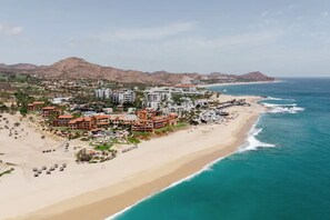 A coastal resort with beachfront villas, a pool area, and a view of the ocean. - Zoëtry Casa Del Mar Los Cabos One Bedroom Suite Ocean View (San José del Cabo)
